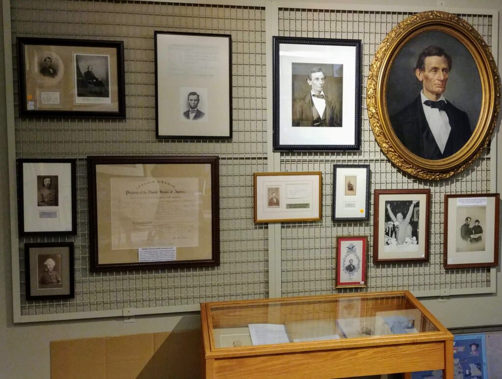 Abraham Lincoln Book Shop with custom framed portrait and memorabilia hanging on the wired wall