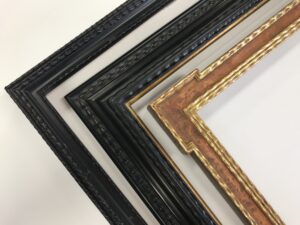 Custom made and finished Dutch picture frames. Ebonized wood, exotic veneers, rippled mouldings and gilded details.